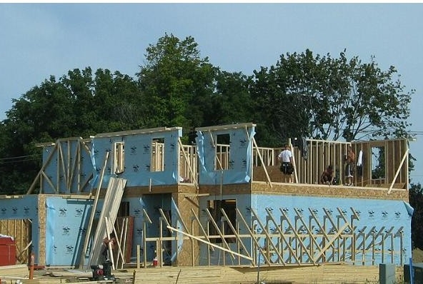 New home under construction in a Pittsfield Township, Michigan subdivision. Photo by Dwight Burdette, CC BY 3.0, via Wikimedia Commons