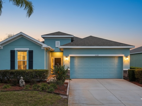 Front exterior of 11129 Kiskadee Cir, a 3 bedroom home for sale in the 55+ Summertree community of New Port Richey, FL 34654