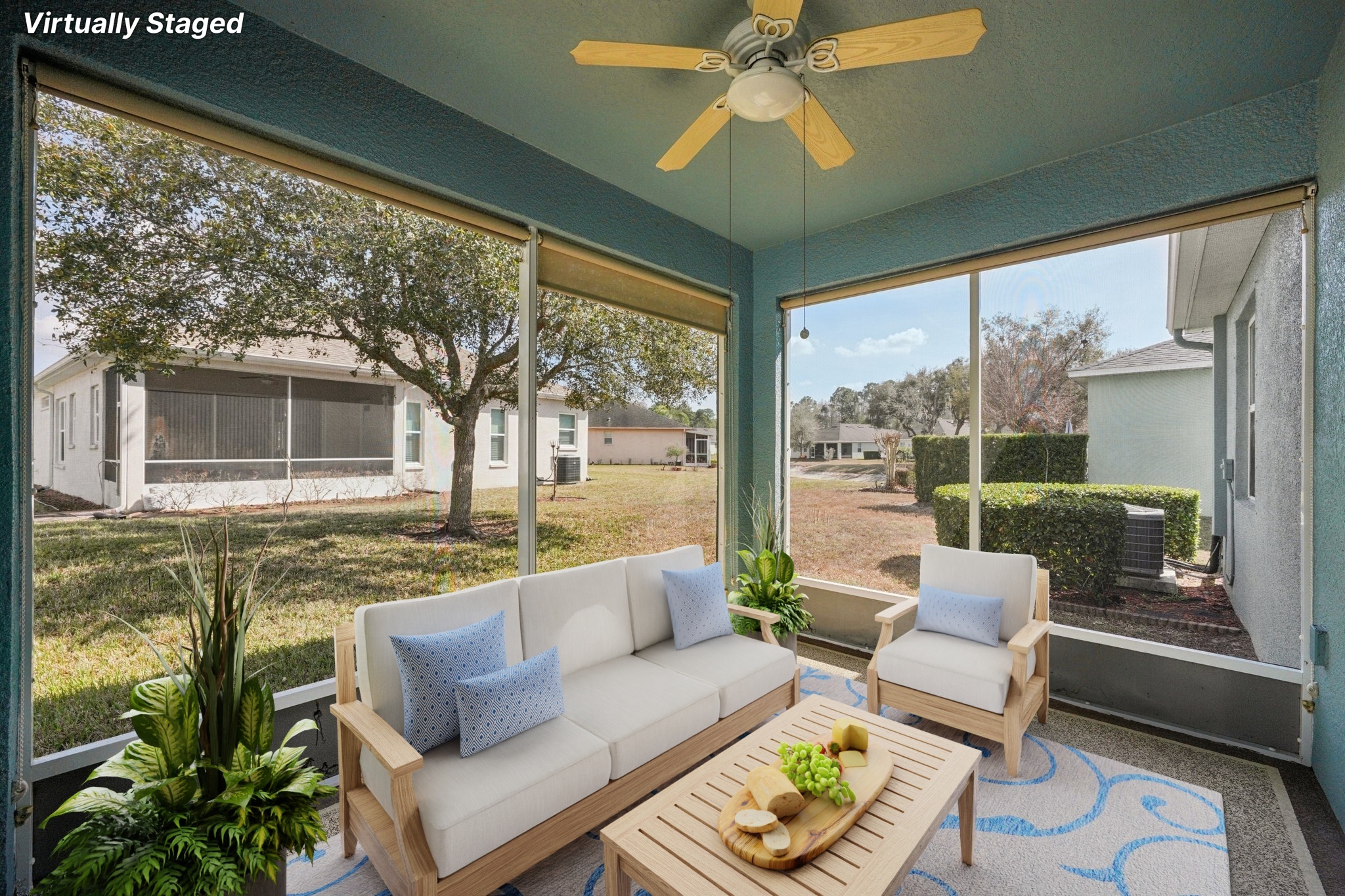 Screened lanai perfect for morning coffee at 11129 Kiskadee Cir in Summertree, New Port Richey FL