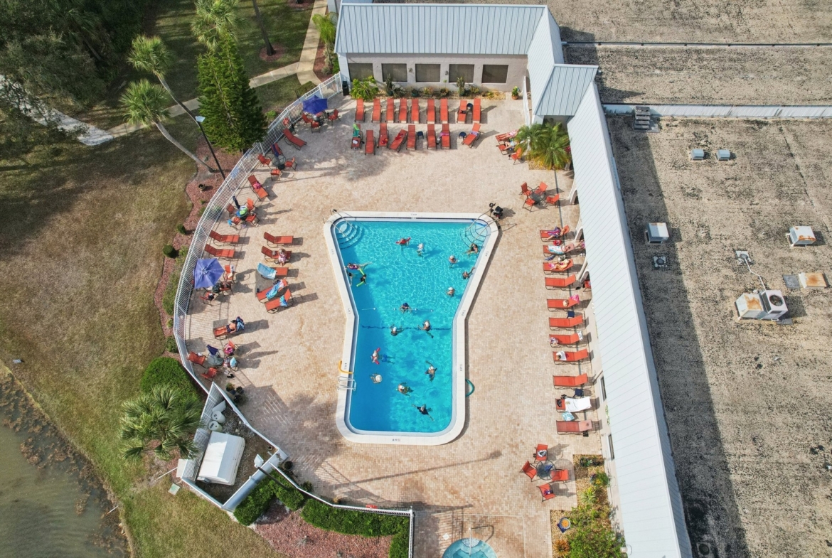 Heated community pool and spa at Summertree in New Port Richey, FL 34654