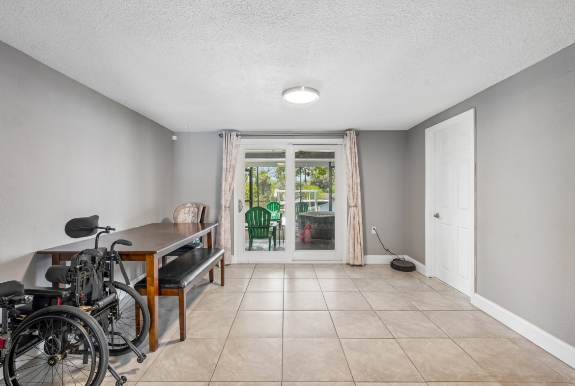 Bonus flex room with access to the screened lanai at 1133 Grand Blvd, Holiday FL 34690