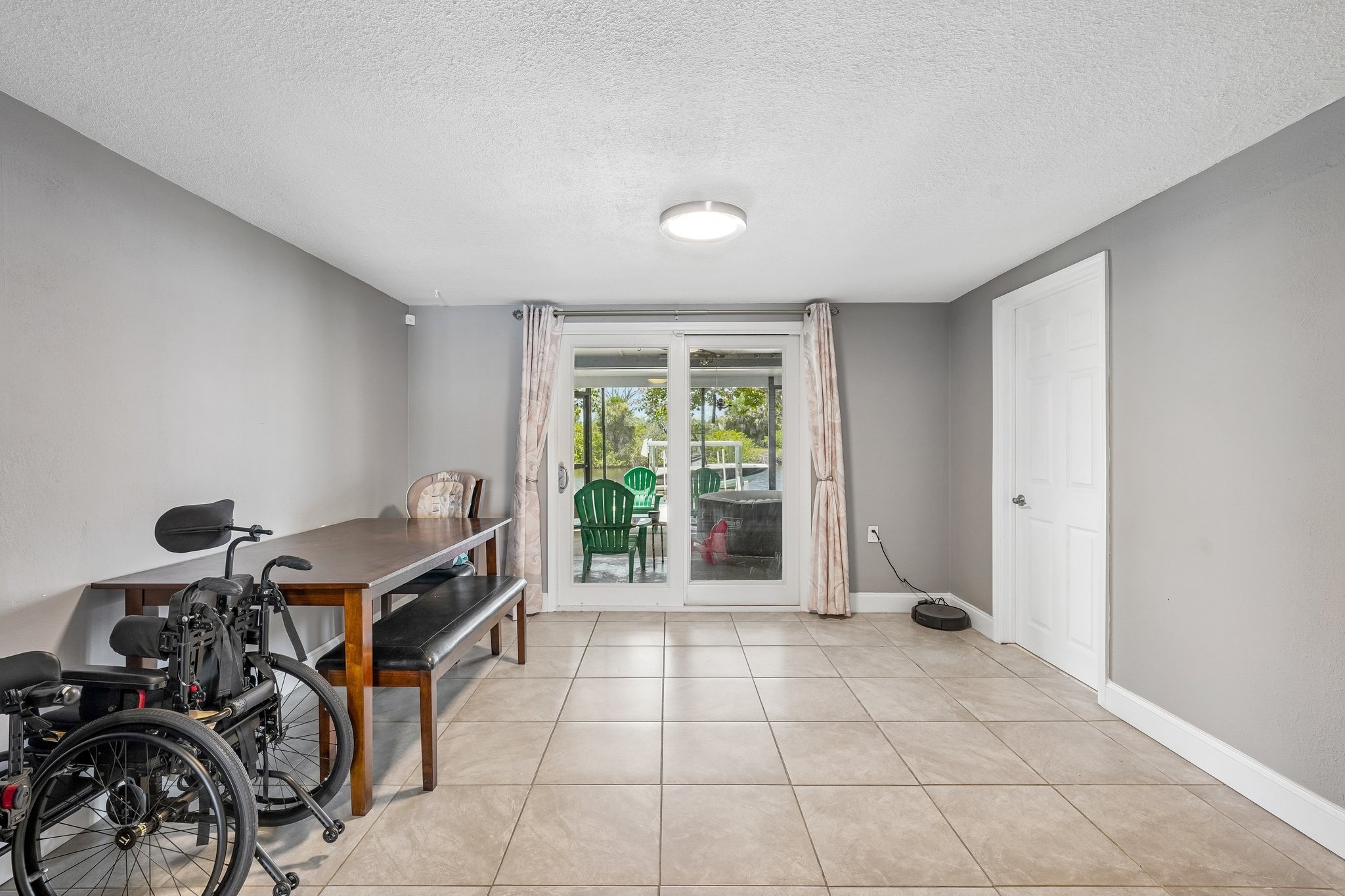 Bonus flex room with access to the screened lanai at 1133 Grand Blvd, Holiday FL 34690