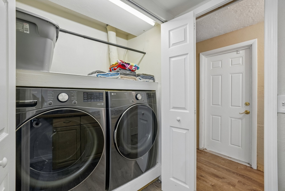 Inside laundry closet with premium LG washer and dryer at 1133 Grand Blvd, Holiday FL 34690