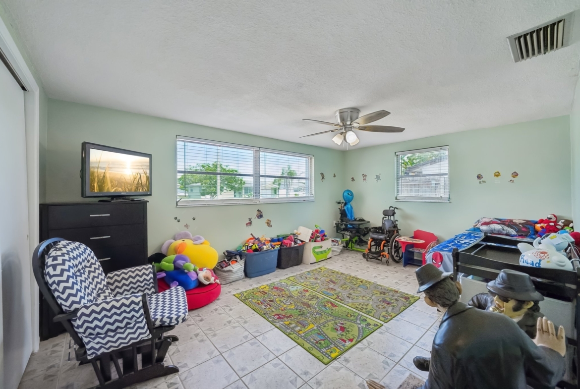 Versatile bonus room ideal for a home office or gym at 1133 Grand Blvd, Holiday FL