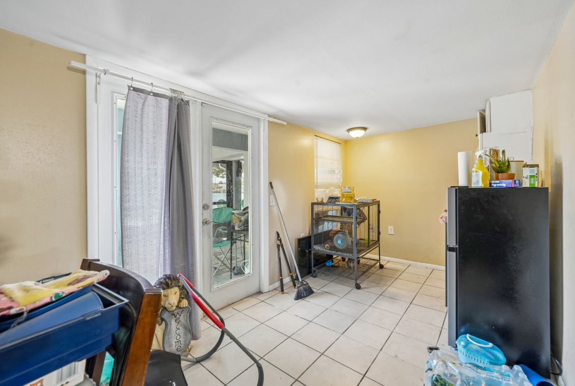 Converted garage perfect for a workshop or hobby space at 1133 Grand Blvd, Holiday FL 34690