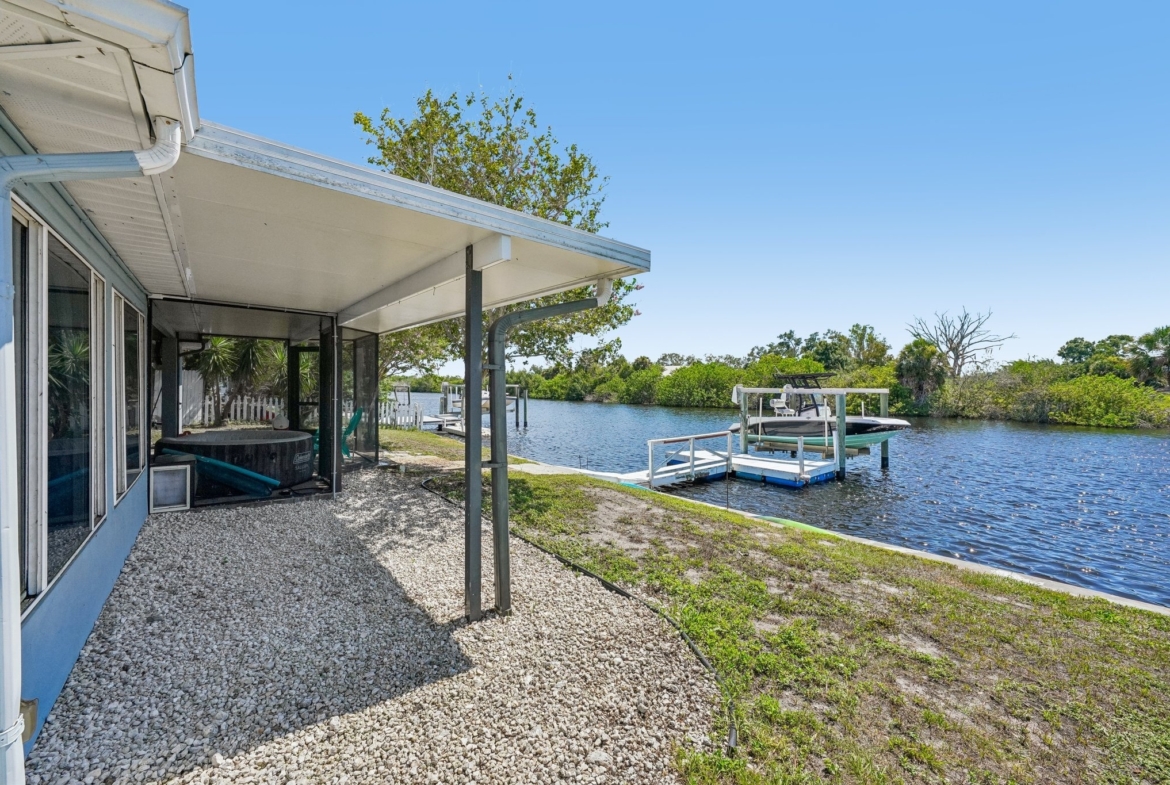Elegant pavers leading to the private pier where you can catch snook and redfish, Holiday FL