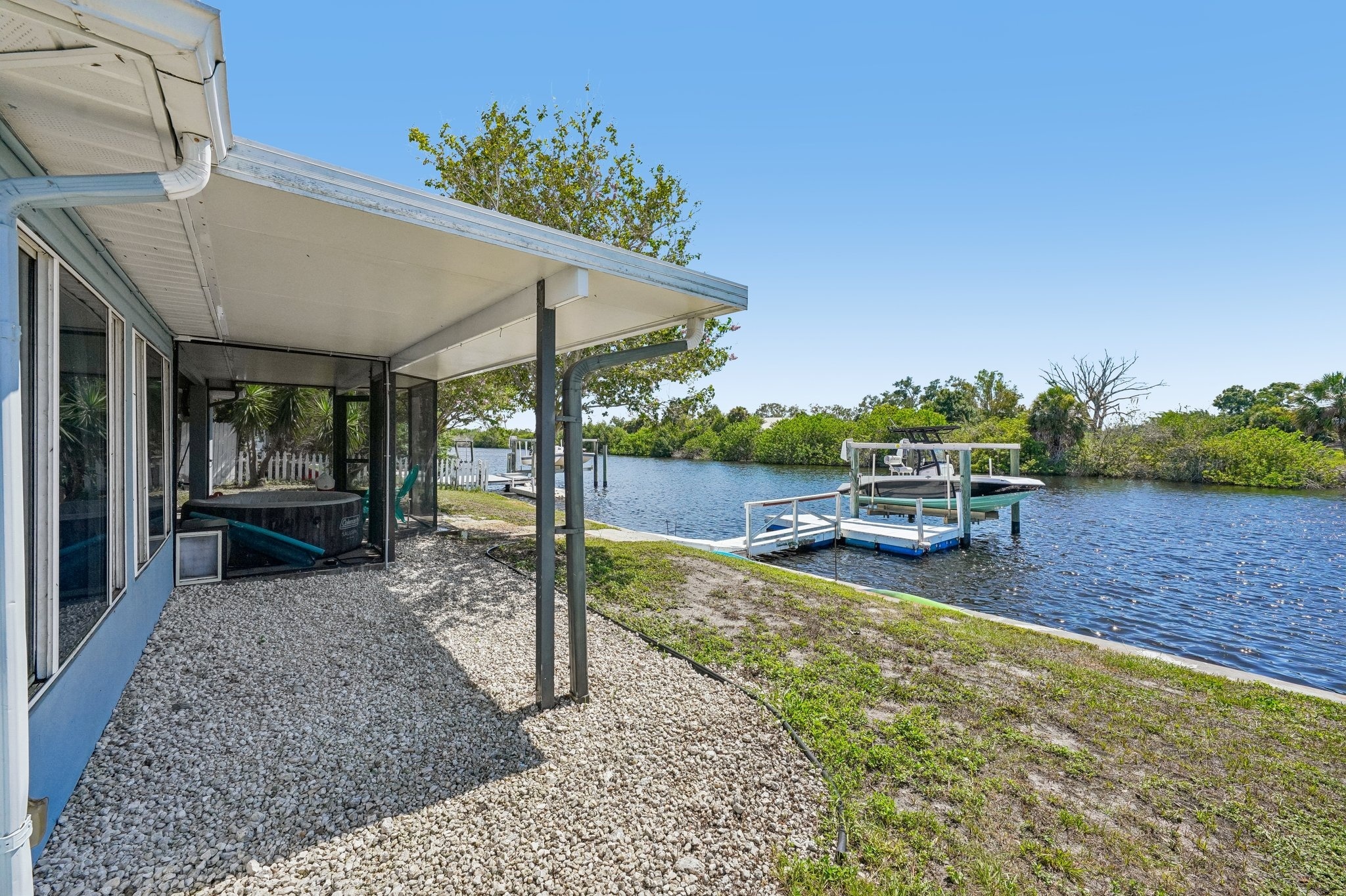 Elegant pavers leading to the private pier where you can catch snook and redfish, Holiday FL
