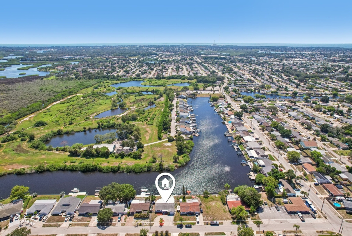 Aerial showing the canal with direct access to the Anclote River and the Gulf, Holiday FL