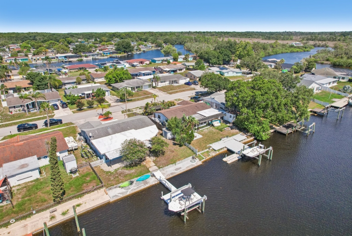 Aerial of the 65 feet of Anclote River frontage at 1133 Grand Blvd, Holiday FL 34690