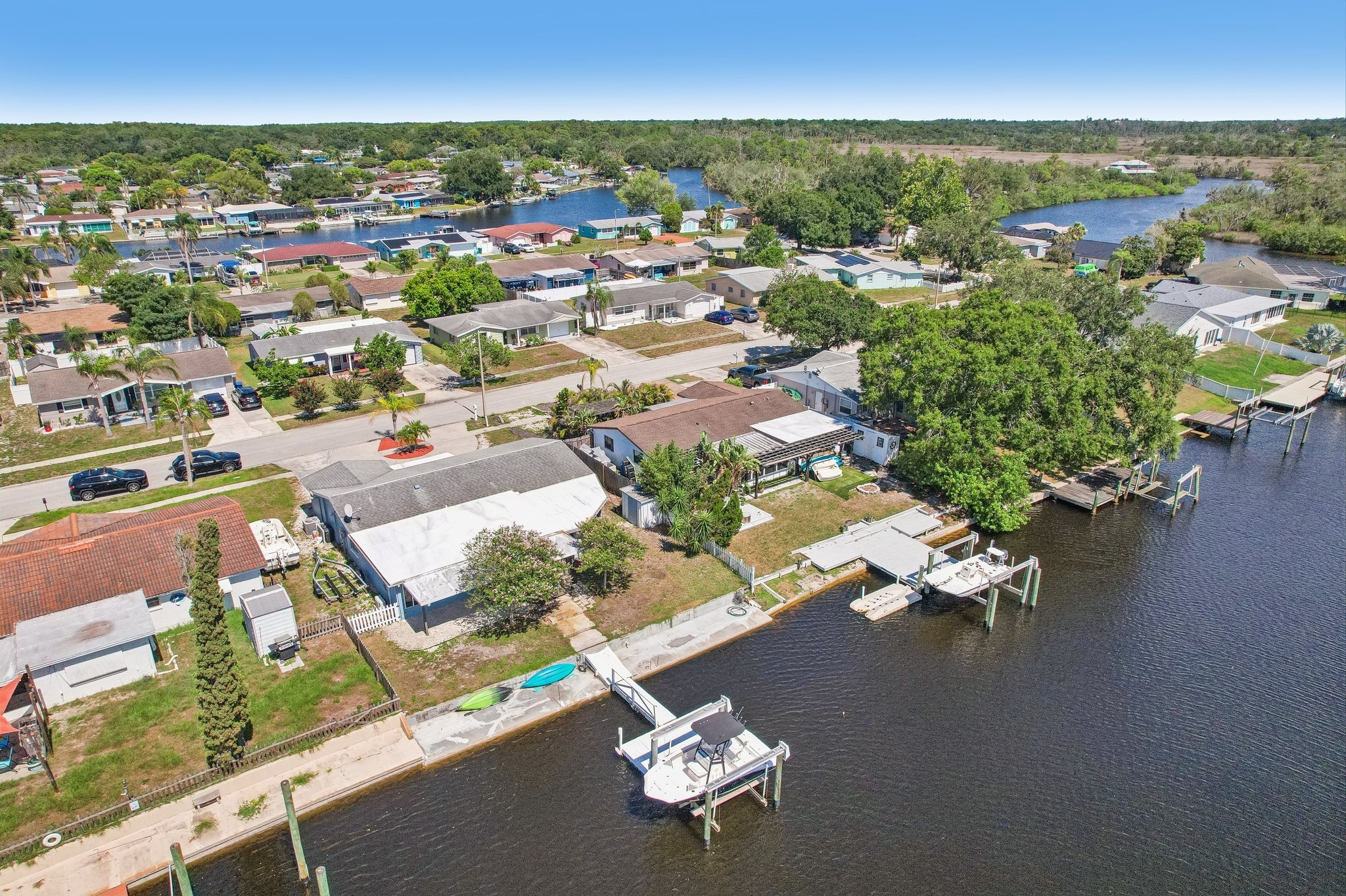 Aerial of the 65 feet of Anclote River frontage at 1133 Grand Blvd, Holiday FL 34690