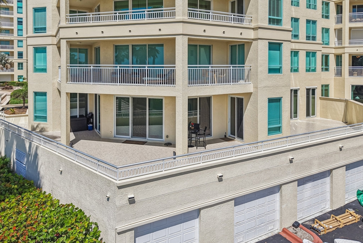 Exterior of The Grande on Sand Key showing private balcony terraces overlooking the Gulf in Clearwater Beach FL