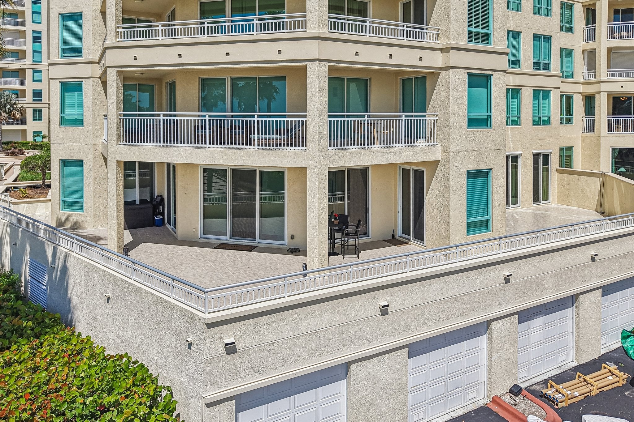 Exterior of The Grande on Sand Key showing private balcony terraces overlooking the Gulf in Clearwater Beach FL