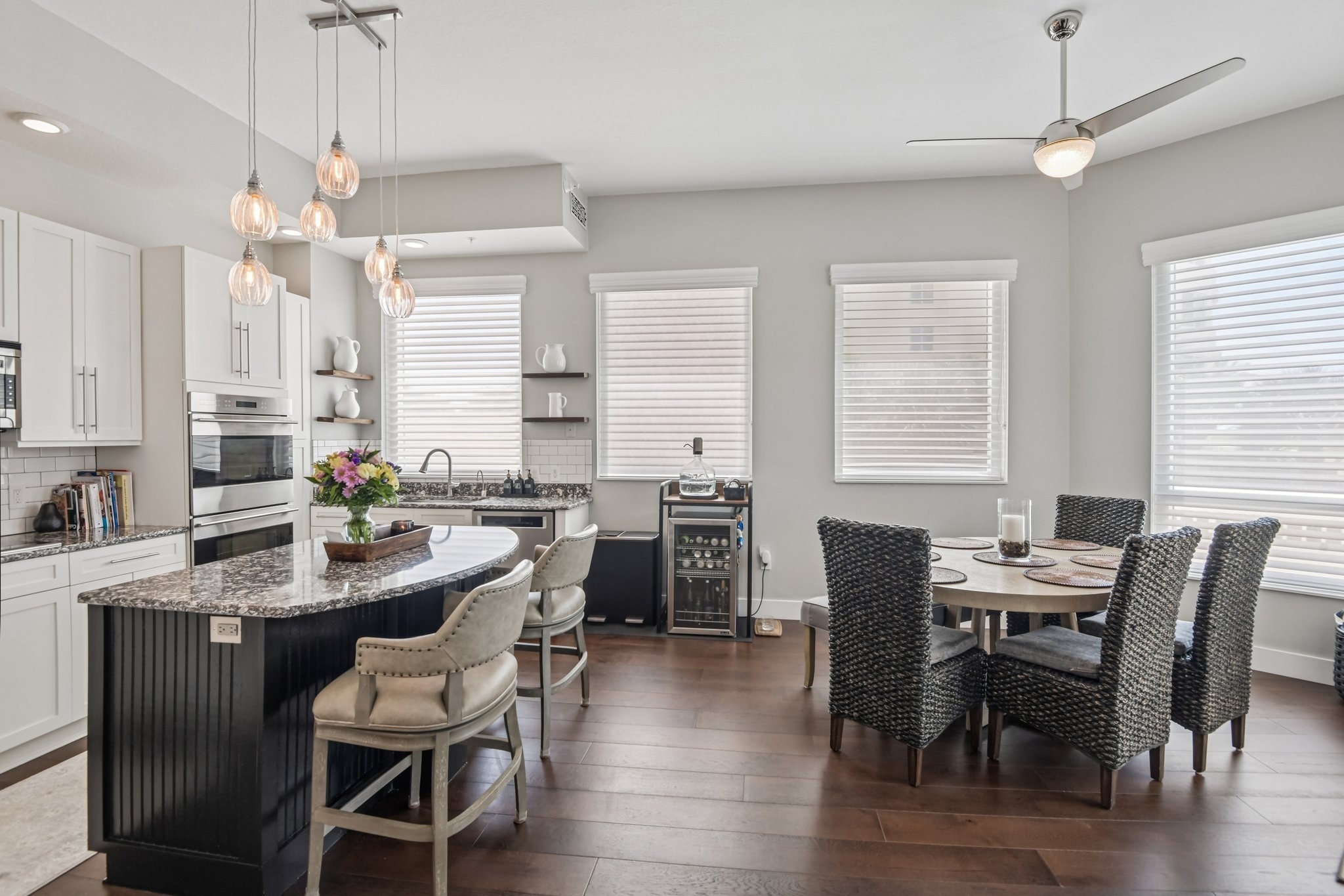 Dining area open to the kitchen at 1180 Gulf Blvd #101, The Grande on Sand Key, Clearwater Beach FL
