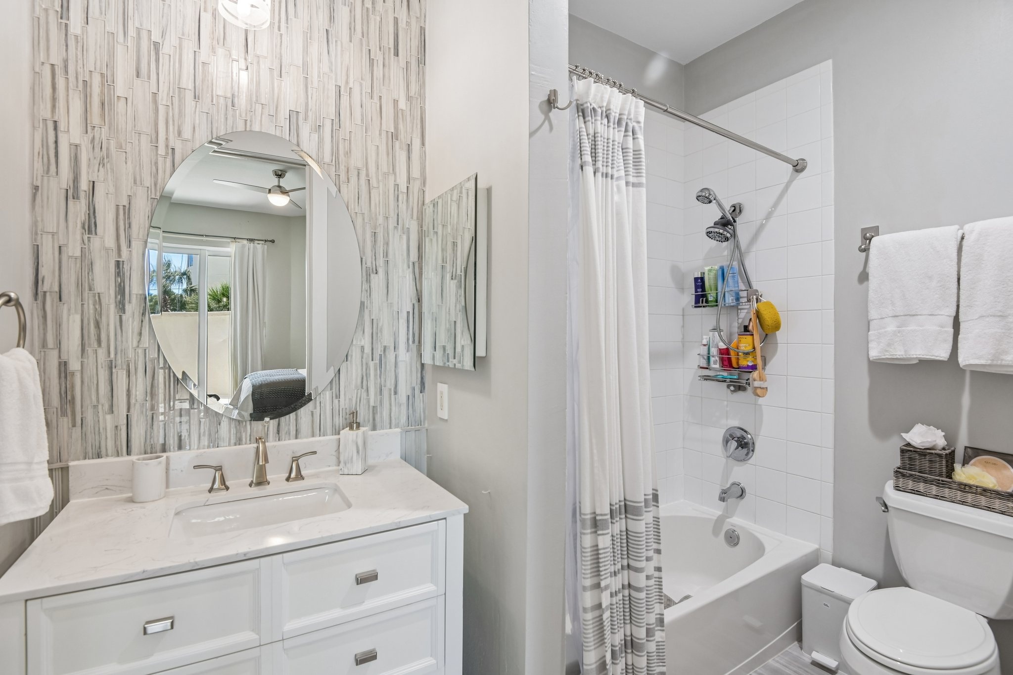 Walk-in shower in the primary bathroom at 1180 Gulf Blvd #101, The Grande on Sand Key, Clearwater Beach FL