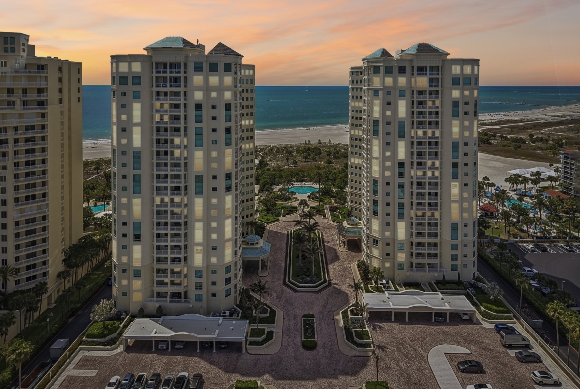 The Grande on Sand Key towers at sunset over the Gulf of Mexico, Clearwater Beach FL 33767