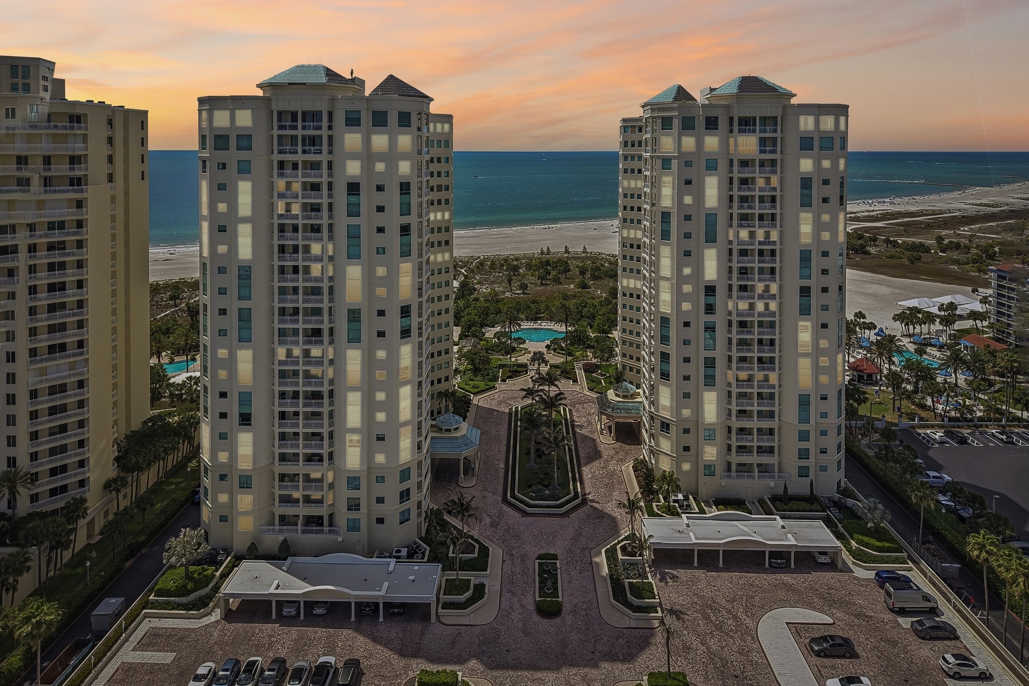 The Grande on Sand Key towers at sunset over the Gulf of Mexico, Clearwater Beach FL 33767
