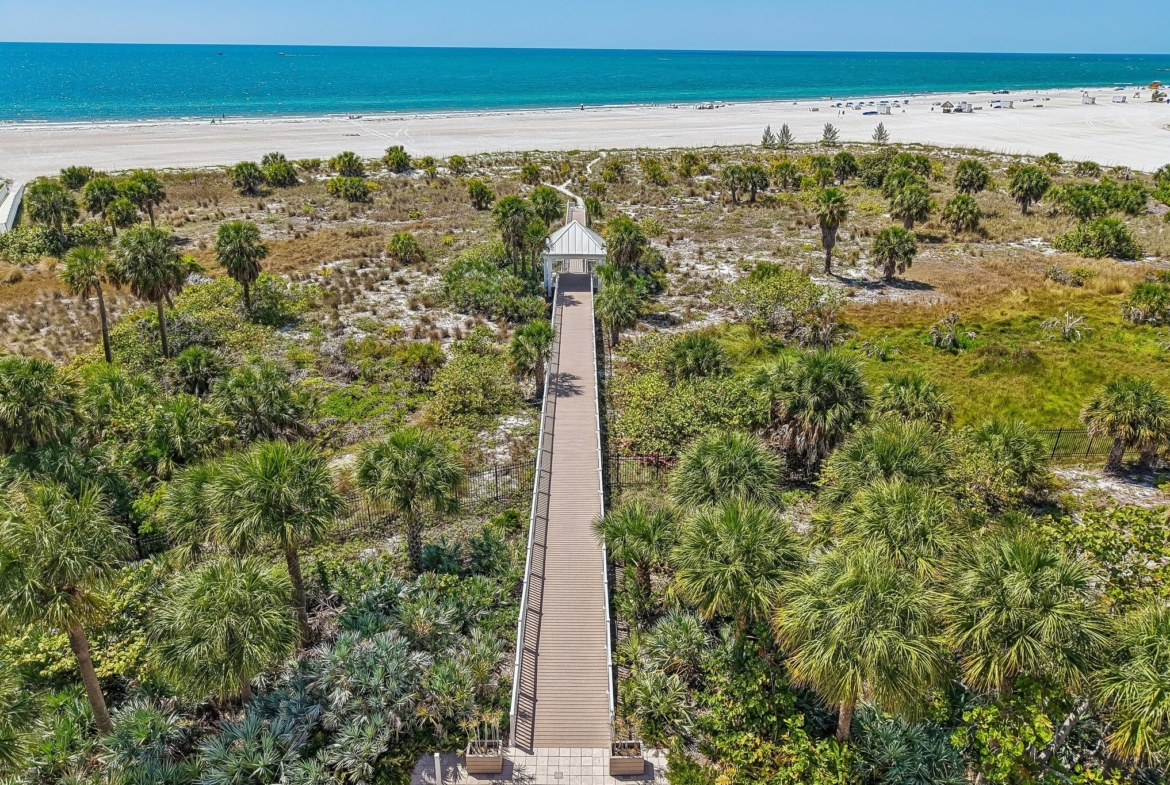 Aerial of the private beach boardwalk at The Grande on Sand Key, Clearwater Beach FL