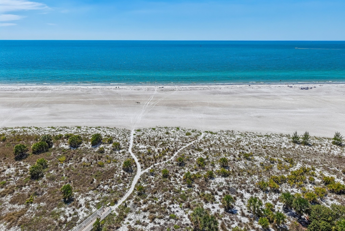 Aerial of the Gulf of Mexico waters off Sand Key Beach, Clearwater Beach FL