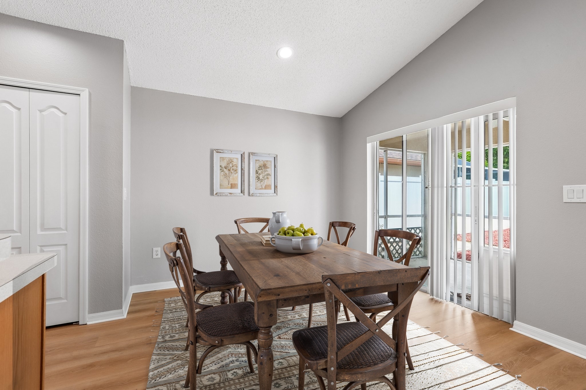 Dining area with French doors leading to the covered lanai at 2638 Big Pine Dr in Key Vista, Holiday FL