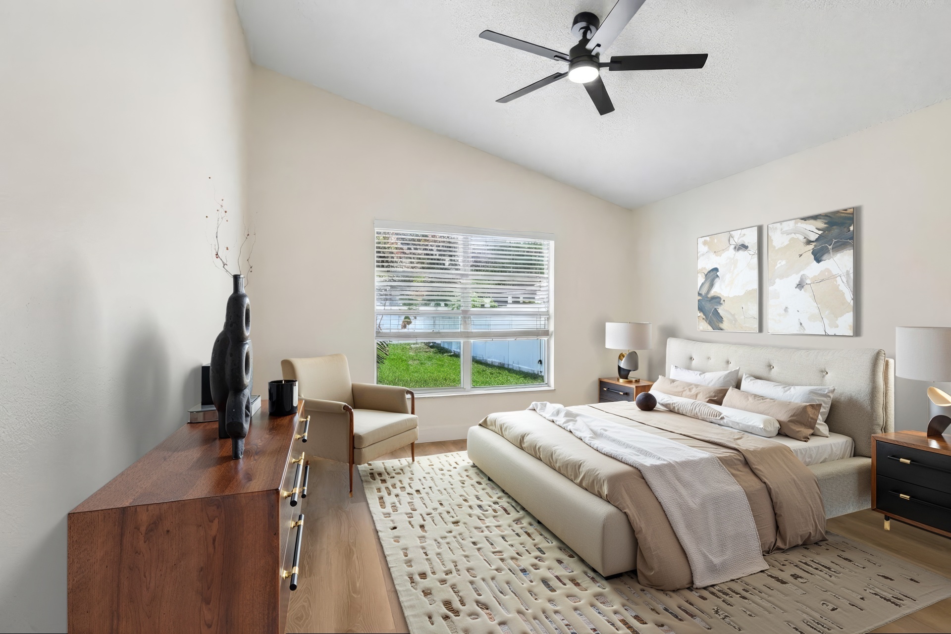 Spacious primary bedroom with vaulted ceiling and ceiling fan at 2638 Big Pine Dr, Holiday FL 34691