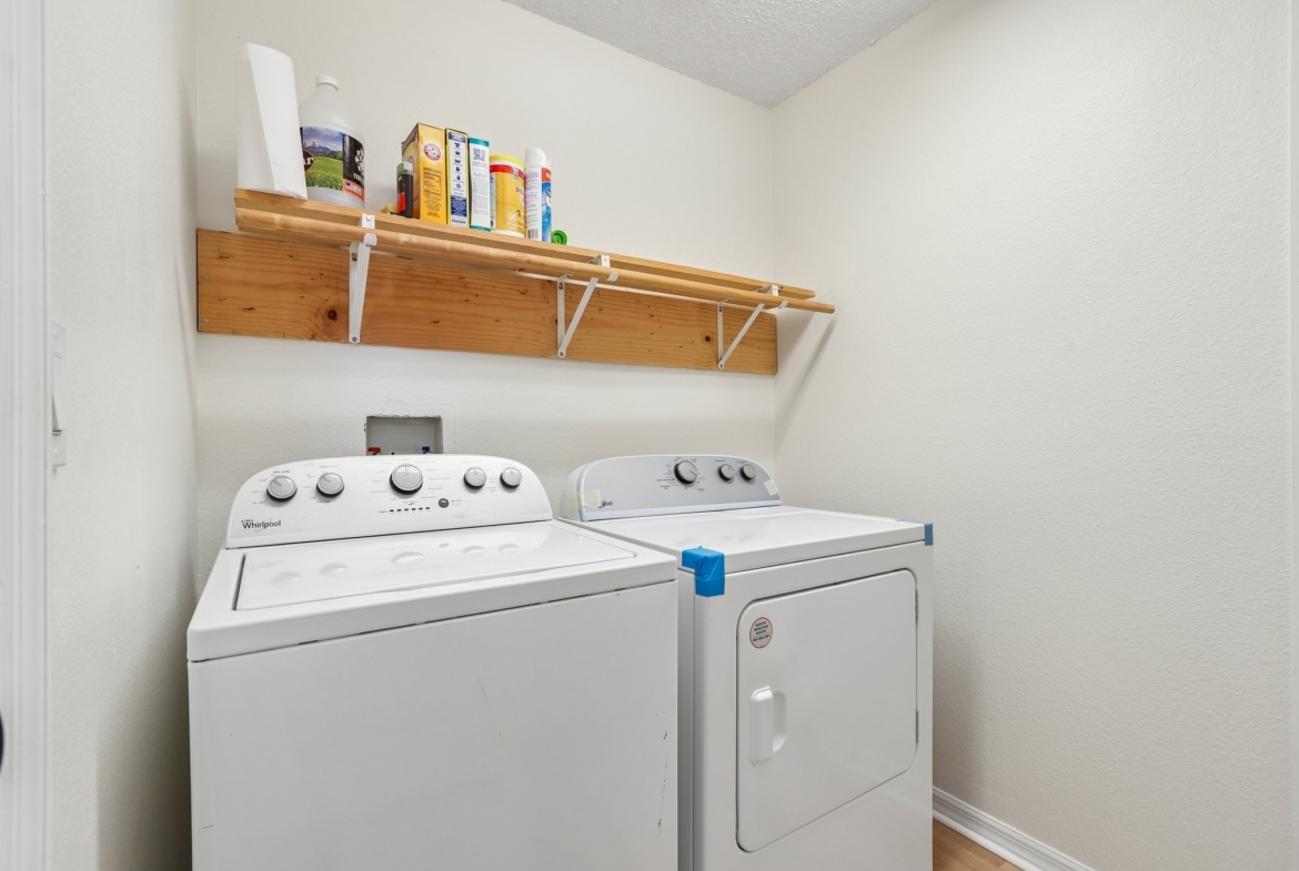 Indoor laundry room with washer and dryer at 2638 Big Pine Dr in Key Vista, Holiday FL