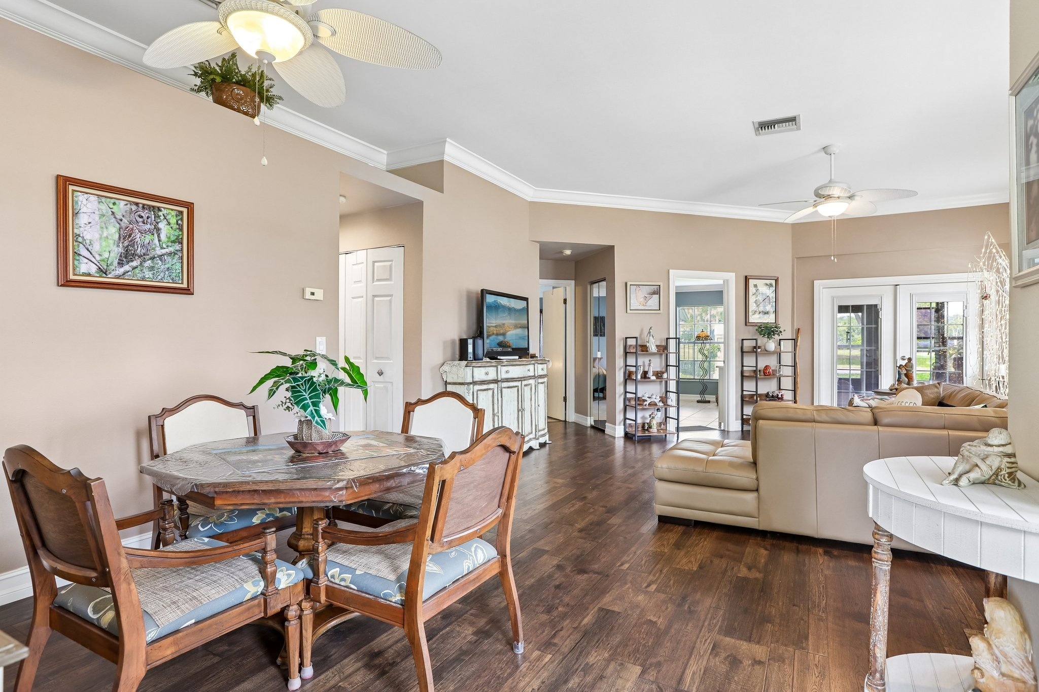 Dining area open to the living room in this 3 bedroom Palm Harbor villa for sale