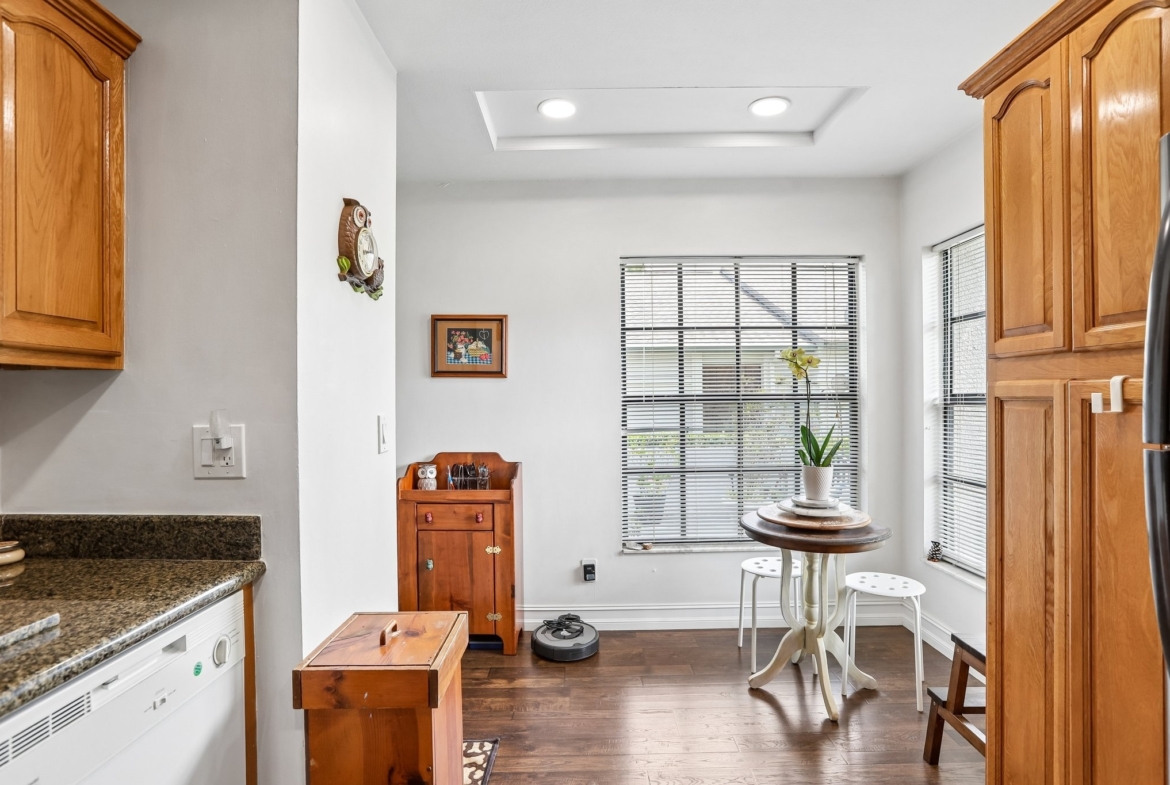 Kitchen looking toward the breakfast nook at 3878 Tanager Pl, Palm Harbor FL 34685