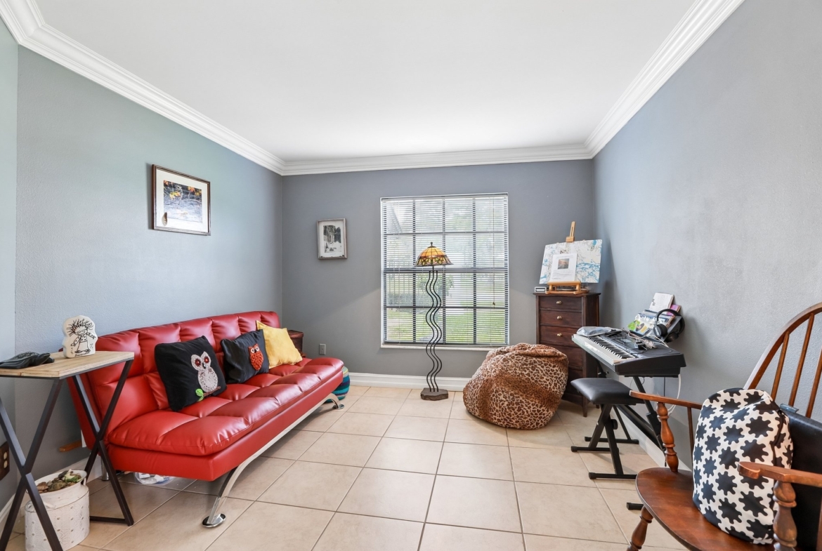 Third bedroom used as a den, library or home office at 3878 Tanager Pl, Palm Harbor FL 34685