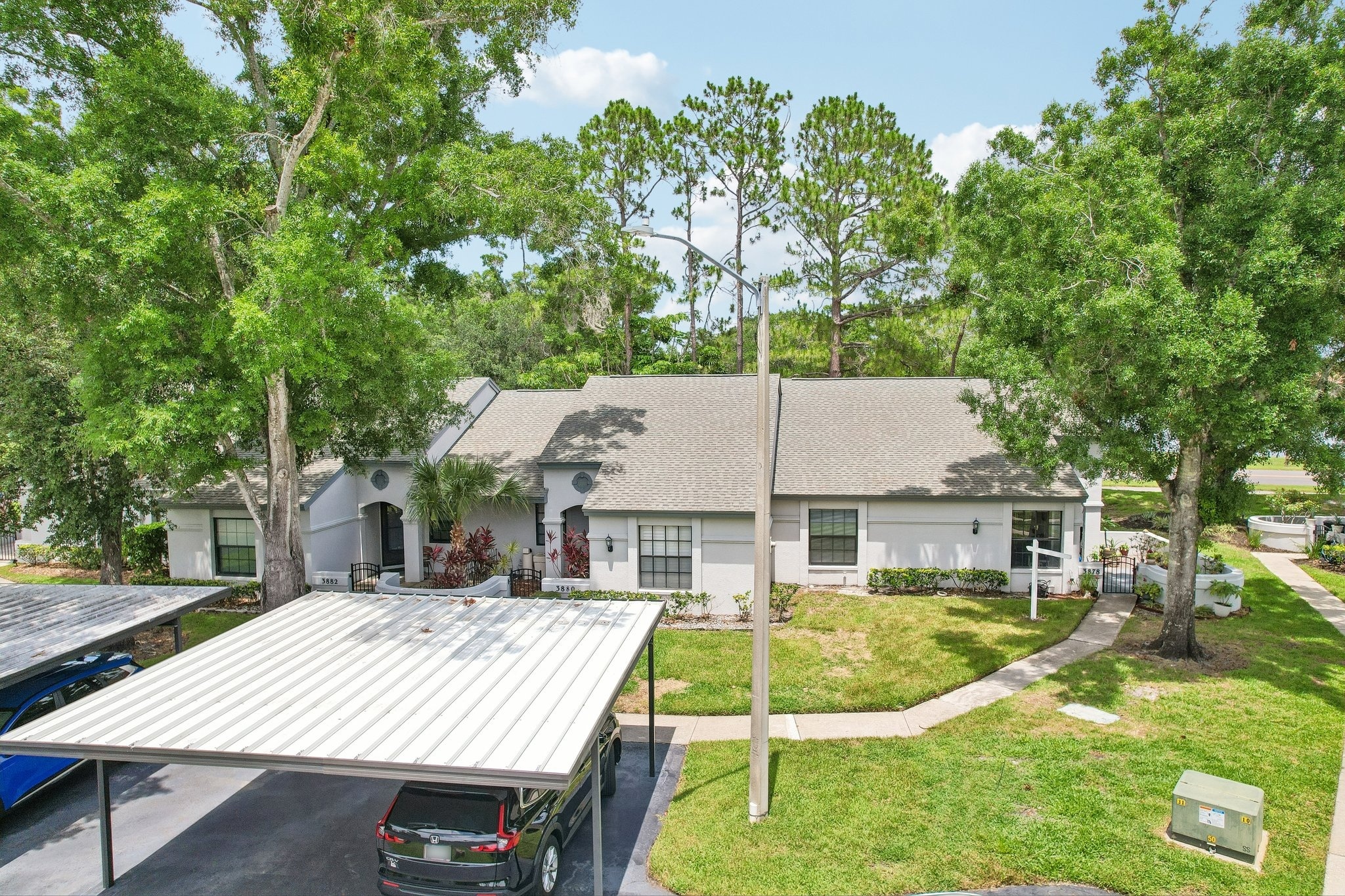 Dedicated covered carport parking space at 3878 Tanager Pl, Palm Harbor, FL 34685
