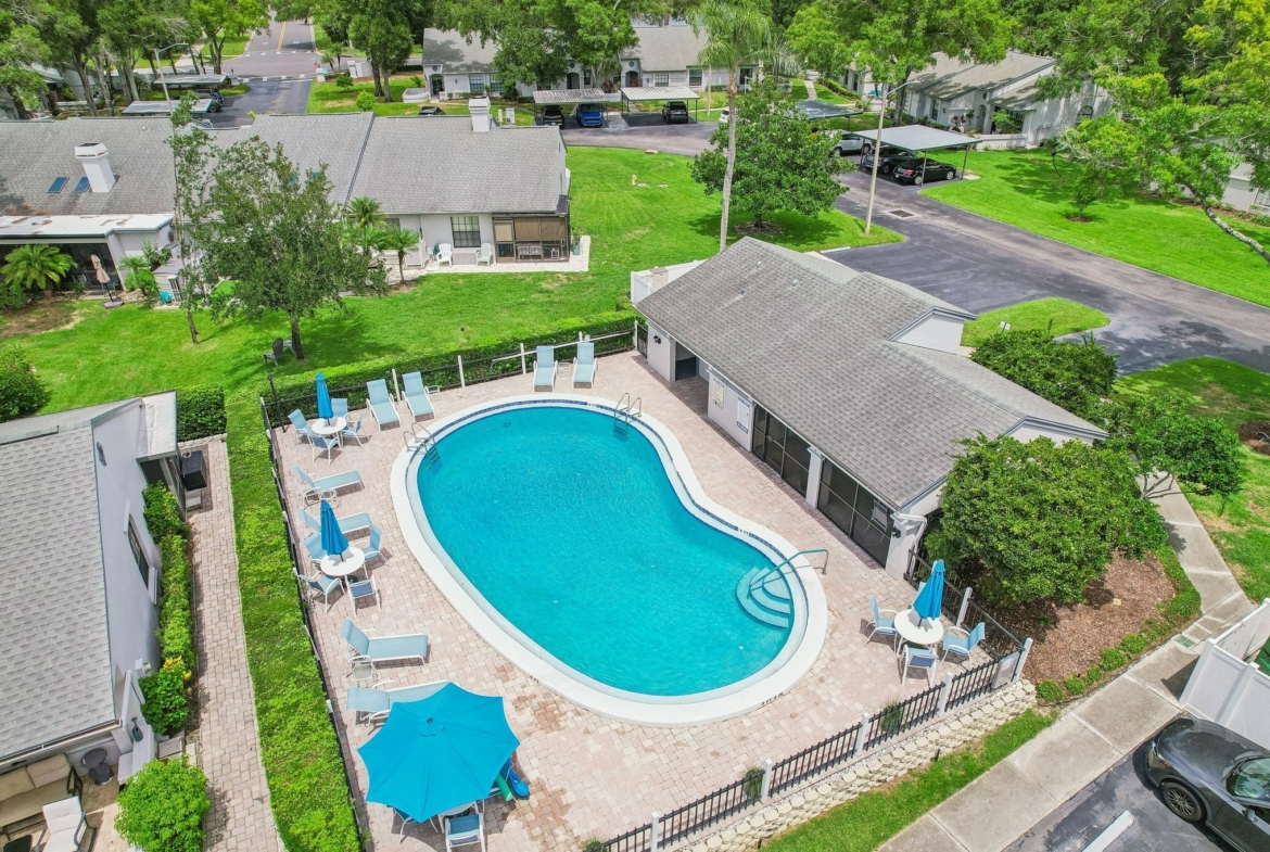 Aerial of the community pool and clubhouse at The Clearing in Palm Harbor, FL 34685