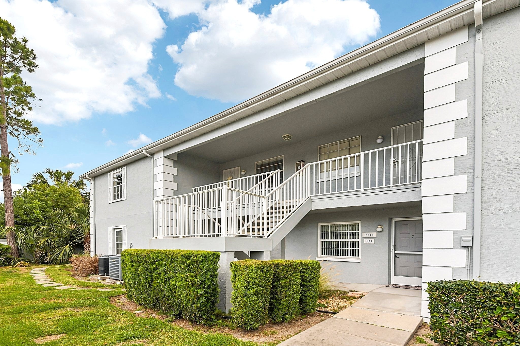 Exterior of Building 11 at The Hillside, a 55+ condo community in Hudson, FL 34667