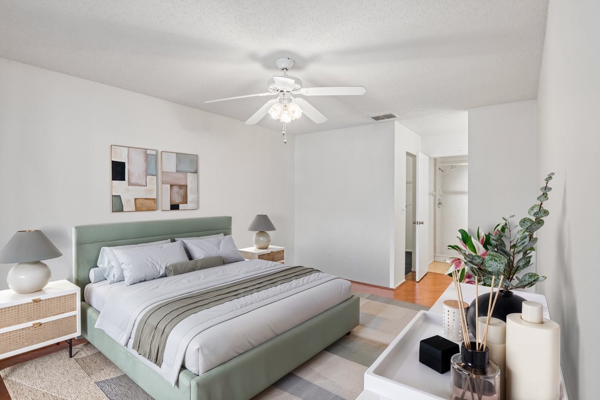 Virtually staged second bedroom in the split floor plan at 7713 Hillside Ct #204, Hudson FL