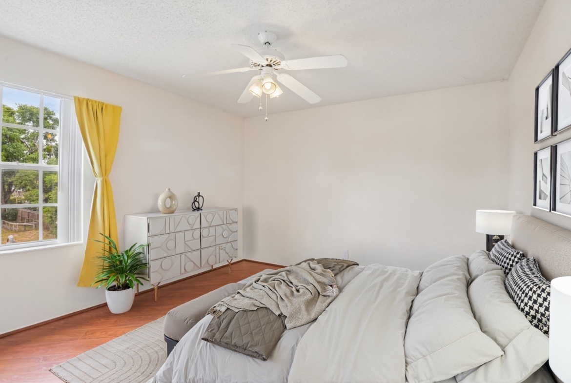 Virtually staged guest bedroom at 7713 Hillside Ct #204 in The Hillside, Hudson FL