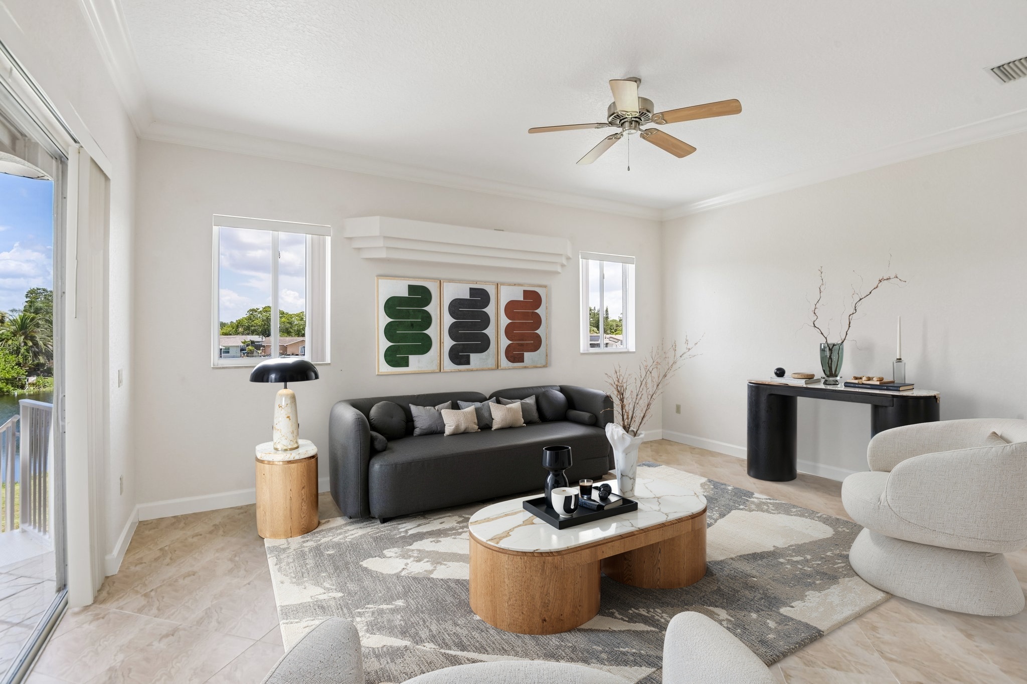 Virtually staged living room with vaulted ceiling and ceiling fan at 8335 Cheyenne Dr, Seminole FL