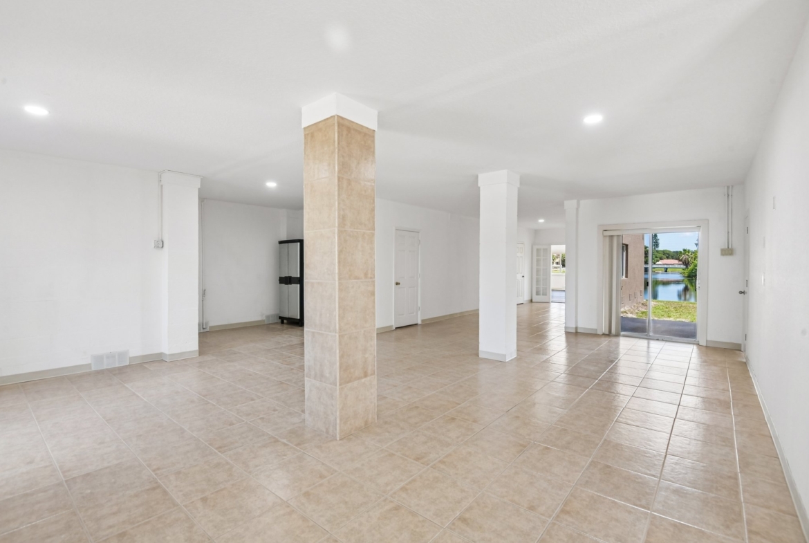 Part of the 2,700+ sq ft lower level at 8335 Cheyenne Dr, ideal for a game room or home gym, Seminole FL