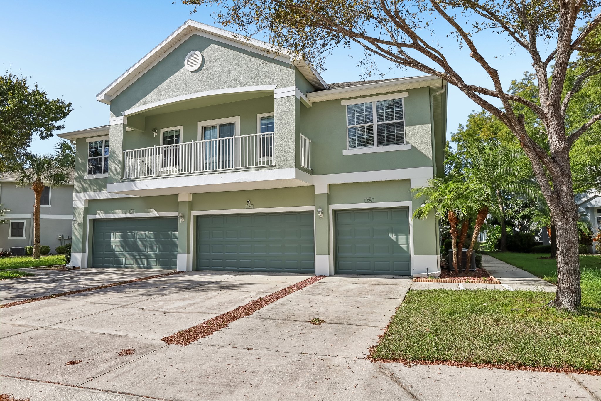 7703 Red Mill Cir, New Port Richey FL end-unit townhome for sale - photo 1